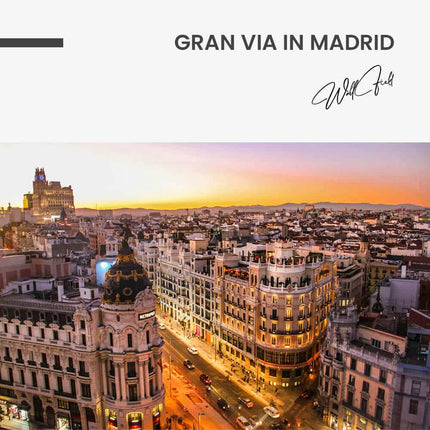 Sunset view of Gran Via in Madrid – Glass